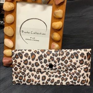 White and brown cheetah print beautiful wallet.